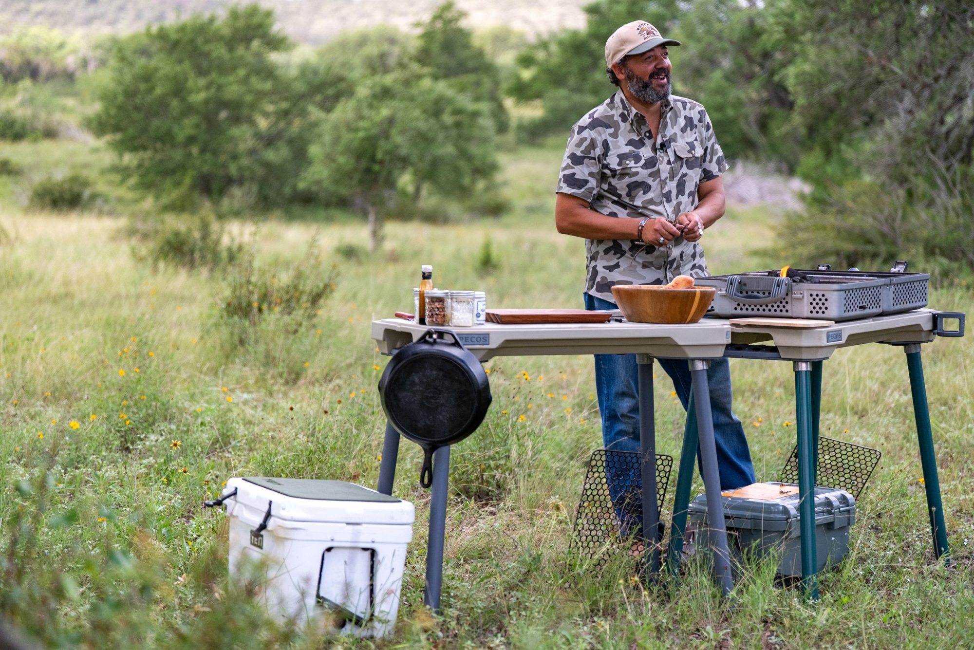 Josh Crumpton cooking wild game at Spoke Hollow Ranch in the Texas Hill Country